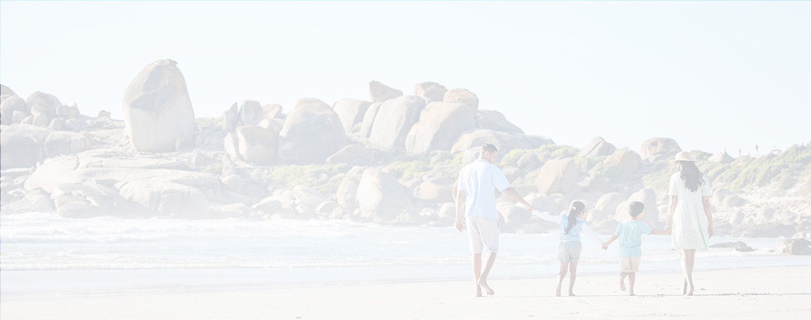 Family walking on the beach